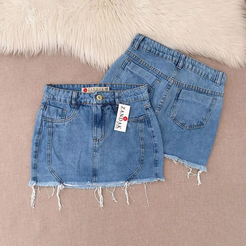 Saia jeans feminina azul manchada Rasgada