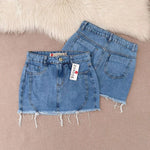 Saia jeans feminina azul manchada Rasgada