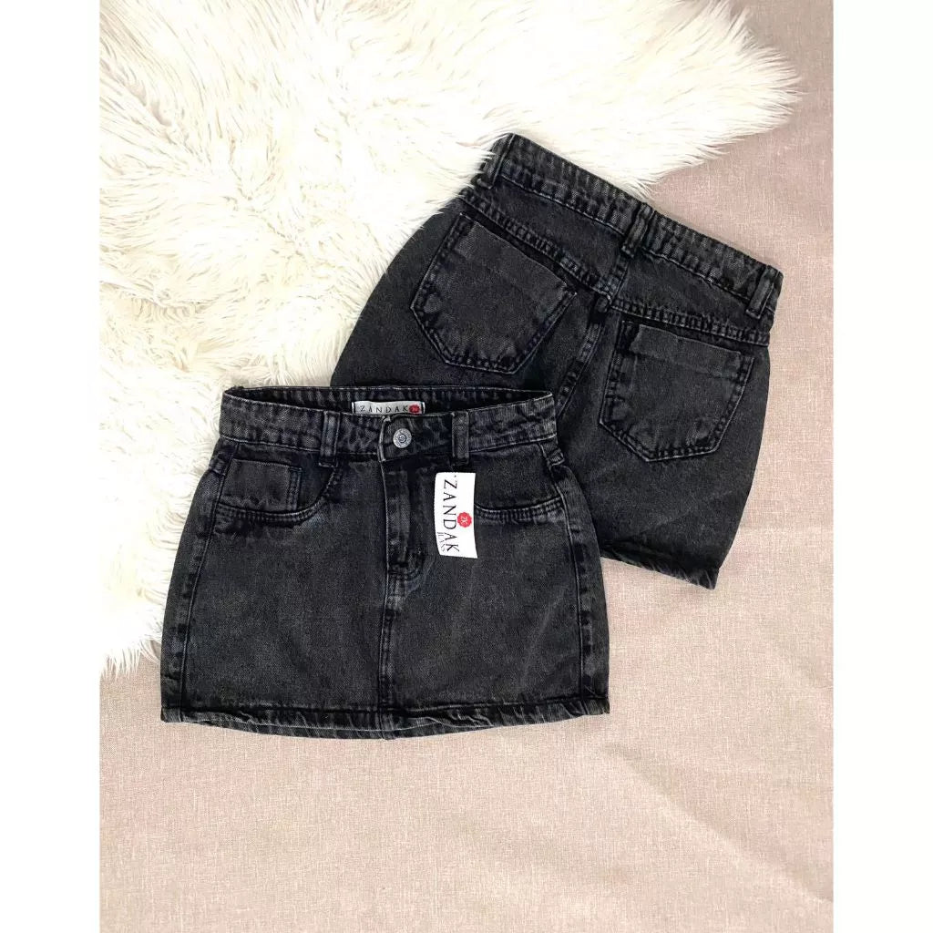 Saia jeans feminina azul manchada Rasgada