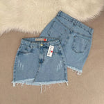 Saia jeans feminina azul manchada Rasgada